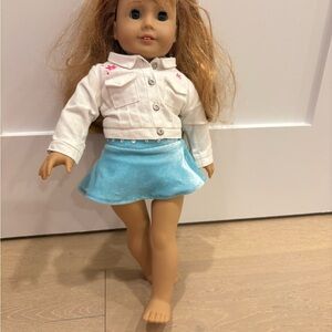 American Girl Doll with White Jacket and Blue Skirt